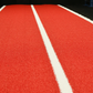 Red Astro Gym Turf Sprint and Sled Track