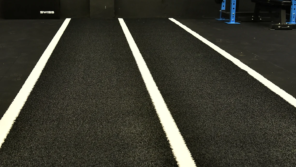 Black Astro Gym Turf Sprint and Sled Track